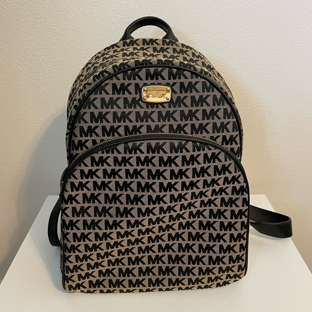 Michael Kors Black Patterned Backpack with gold hardware